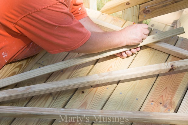 Marking pickets for cutting on sunburst deck railing