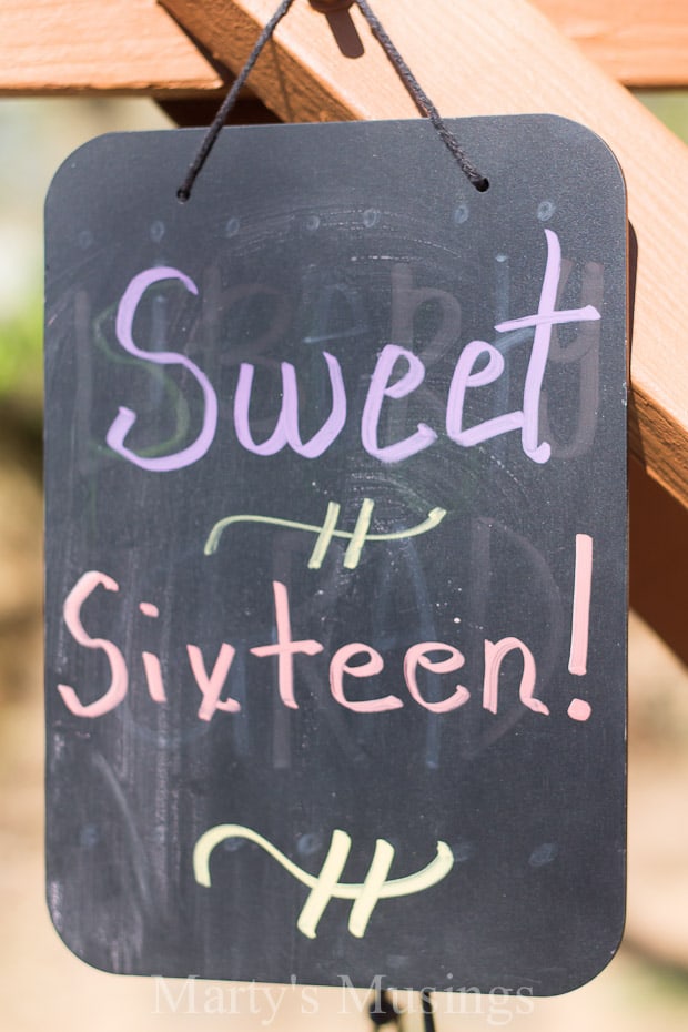 A sign on a wooden table