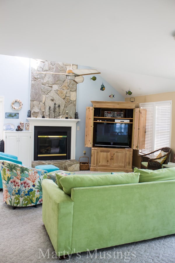 A living room filled with furniture and a fireplace