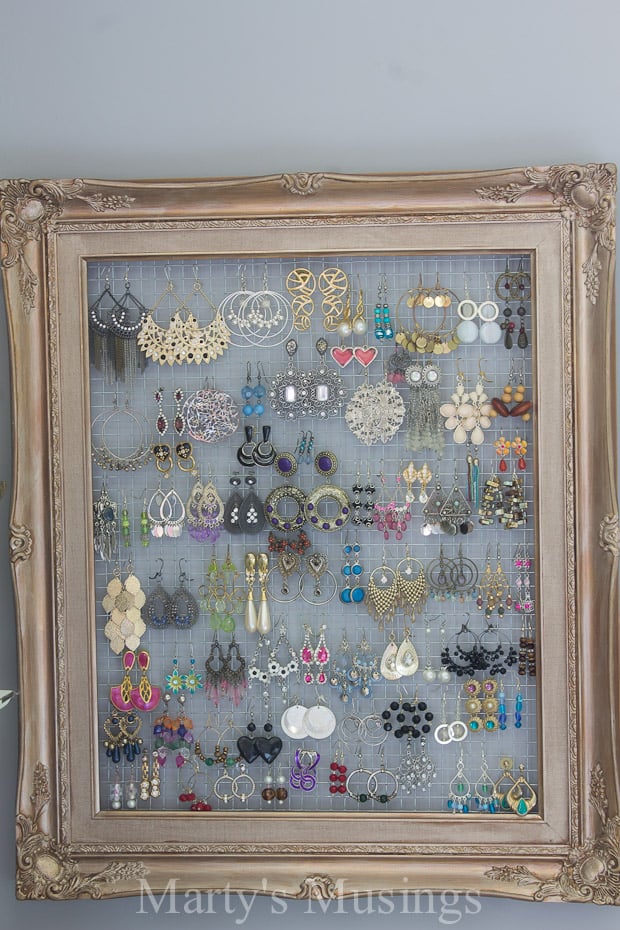 vintage frame with chicken wire as earring organizer