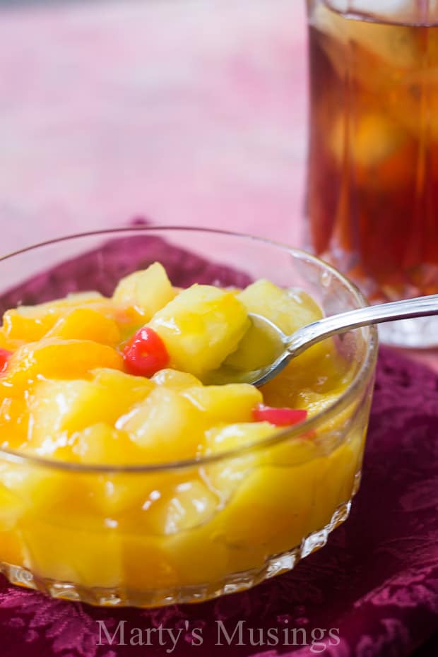 Fruit cocktail salad in glass bowl