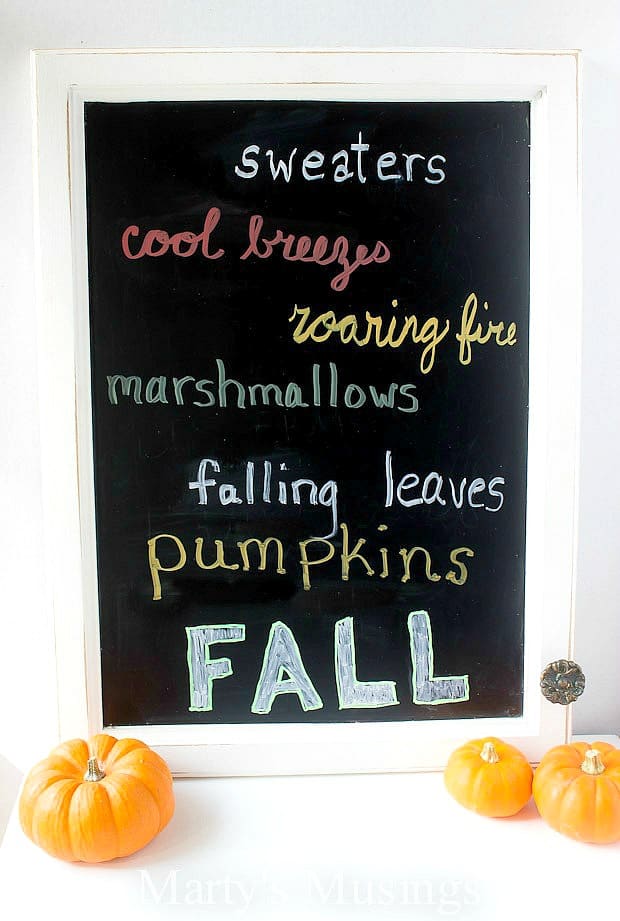 An orange sign on a counter