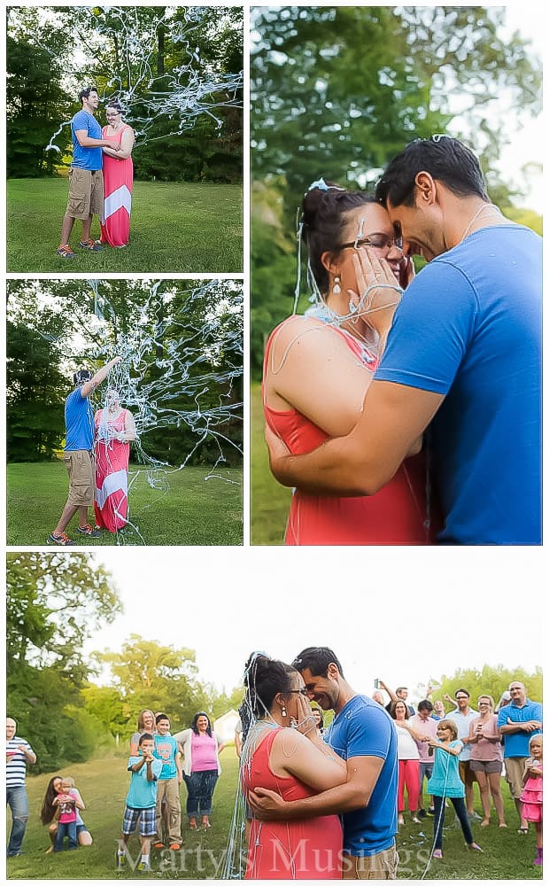 A group of people that are standing in the grass