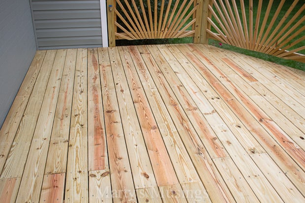 A wooden bench on a wood floor