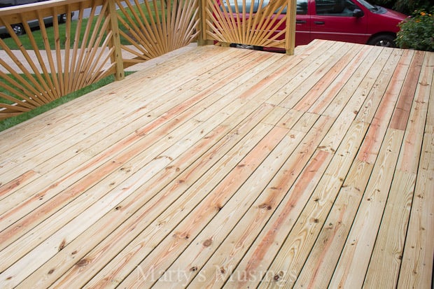 A wooden bench on a wood floor