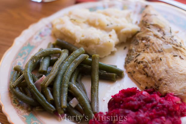 A close up of a plate of food, with Green bean