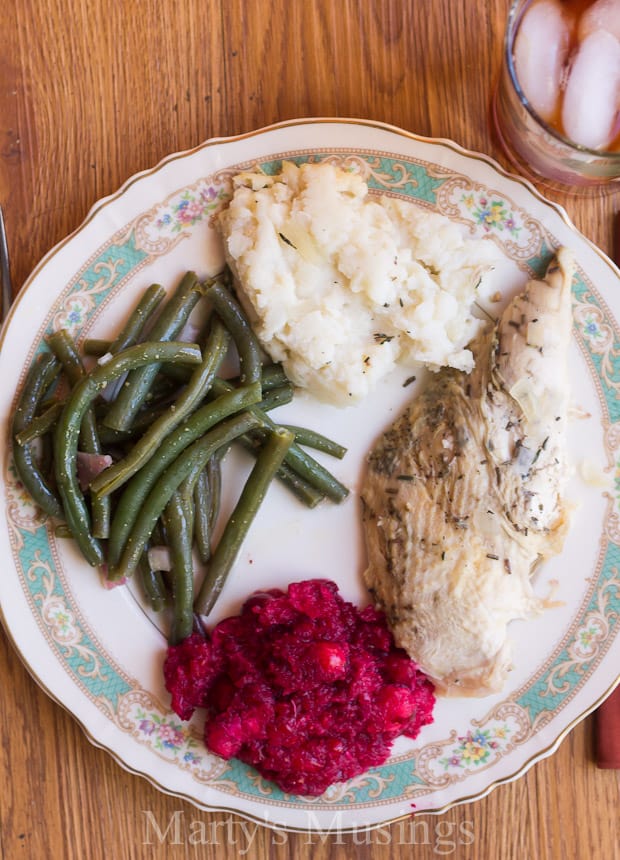 A plate of food on a table, with Green bean and Thanksgiving