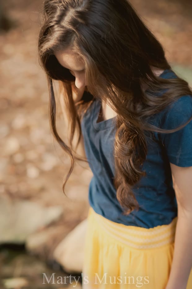 A woman in a blue shirt