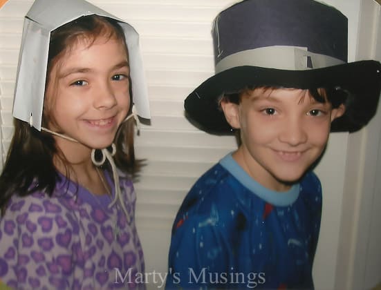 A young child wearing a hat