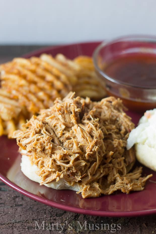 A plate of food on a table, with Pulled pork