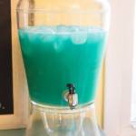 A glass with a blue cup, with Party and Punch