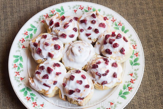 A slice of cake on a plate, with Cinnamon roll and Dough