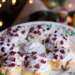 A slice of pizza on a plate, with Cinnamon roll and Cake