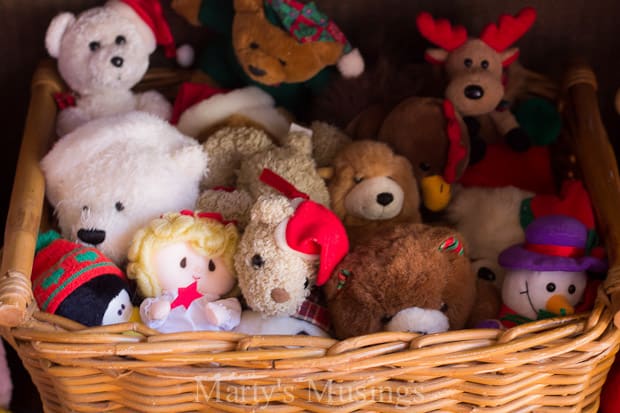 A basket filled with stuffed animals