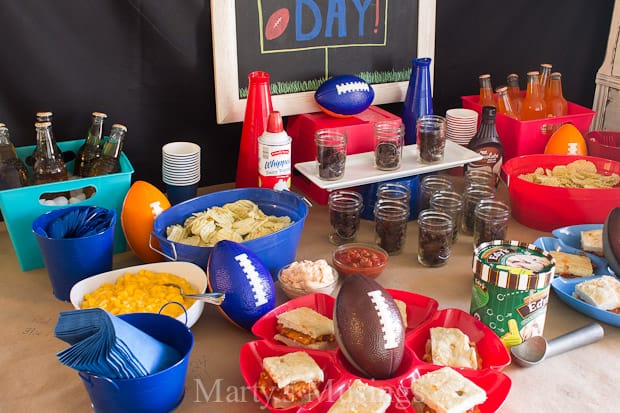 A table topped with plates of food, with Party and Fudge