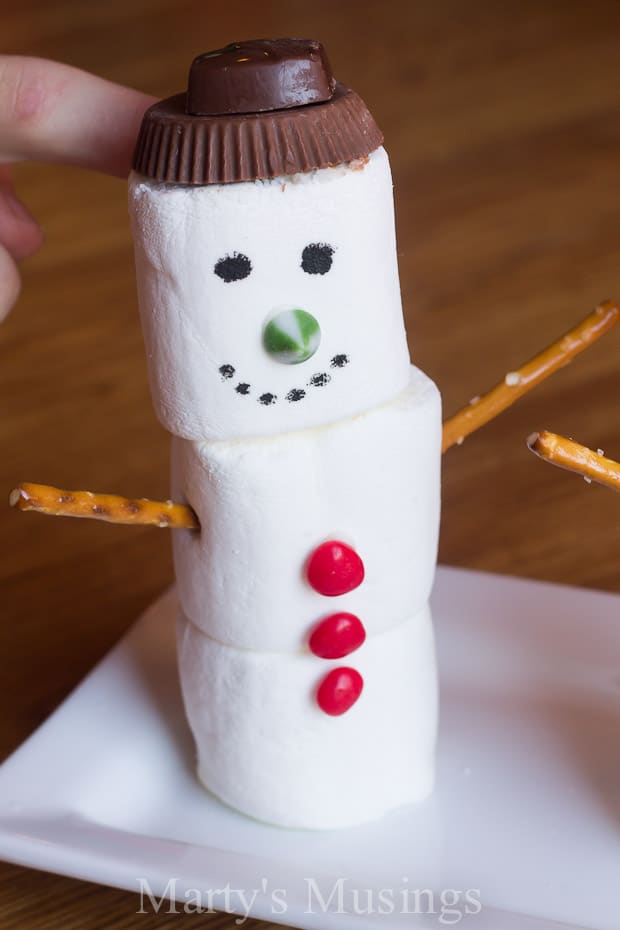 Marshmallow snowman with candy decorations