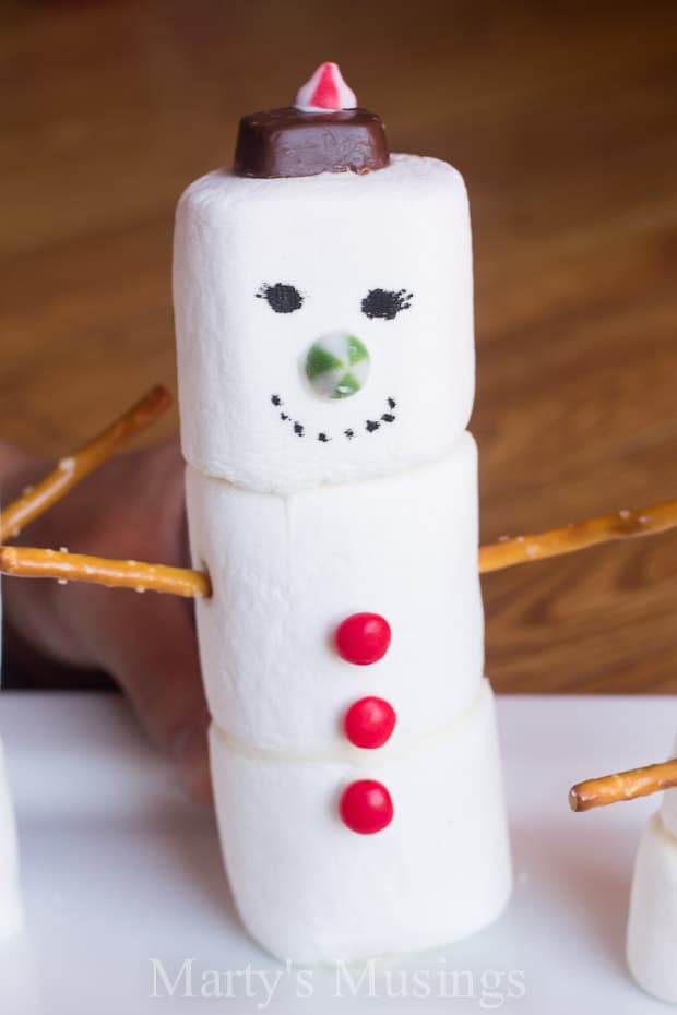 Marshmallow snowman with edible decorations