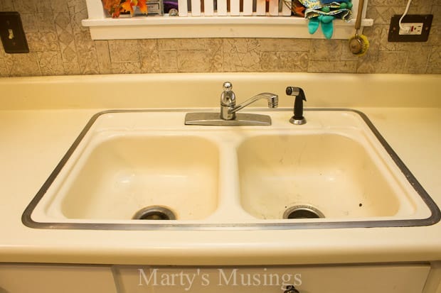 A fountain in front of a sink