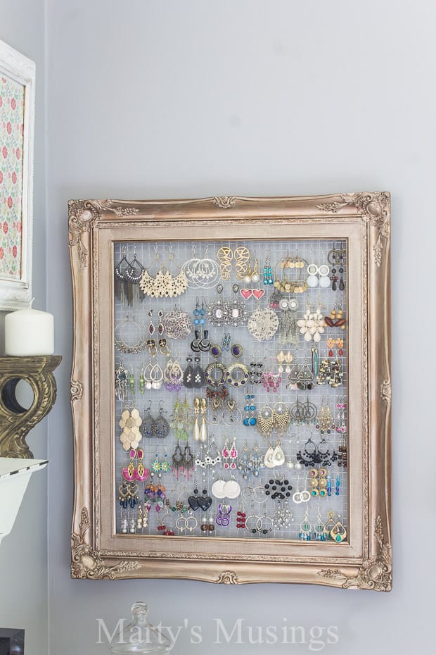vintage frame with chicken wire for hanging earrings