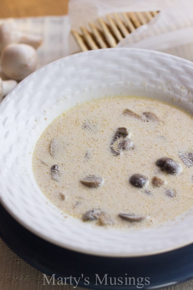 With just a few handy ingredients, this homemade slow cooker Cream of Mushroom Soup from Marty's Musings will delight the entire family and is a tasty budget dinner.