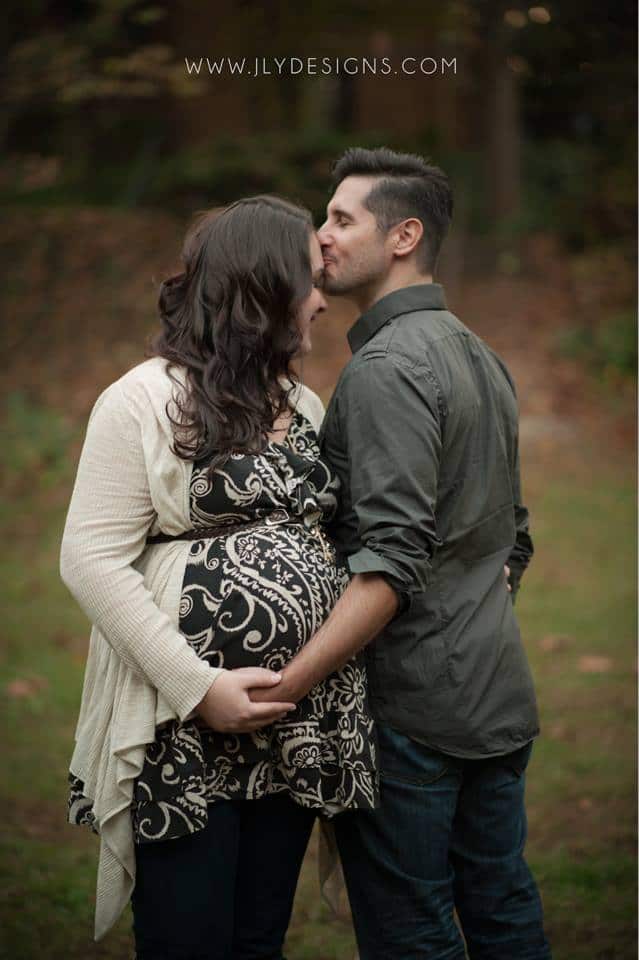 A man standing next to a woman