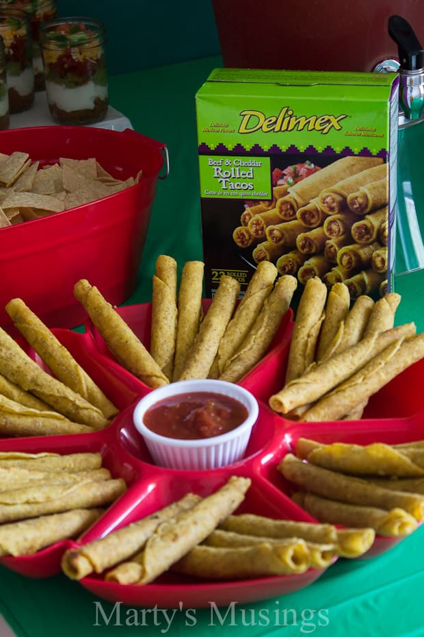 A bunch of food sitting on a table, with Party and Salsa