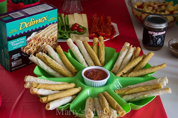 A bunch of food on a table, with Party and Salsa