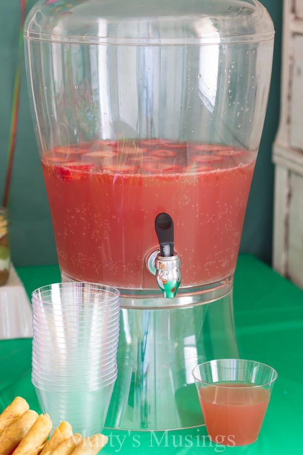 A group of glass bottles on a table, with Party and Salsa