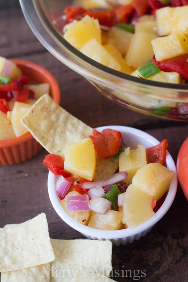 Pineapple salsa in a bowl with chips