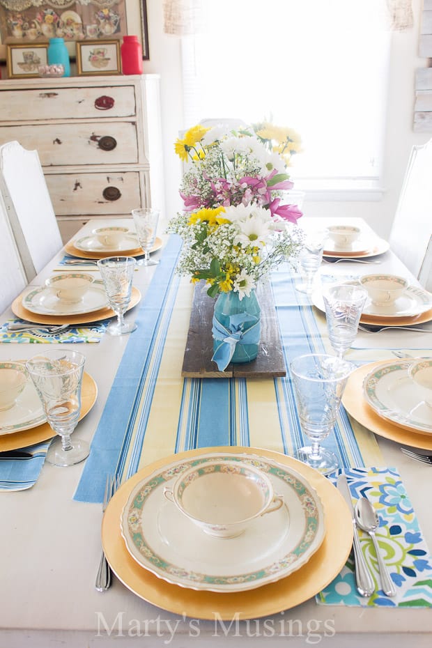 A plate of food on a table, with Blue and Yellow