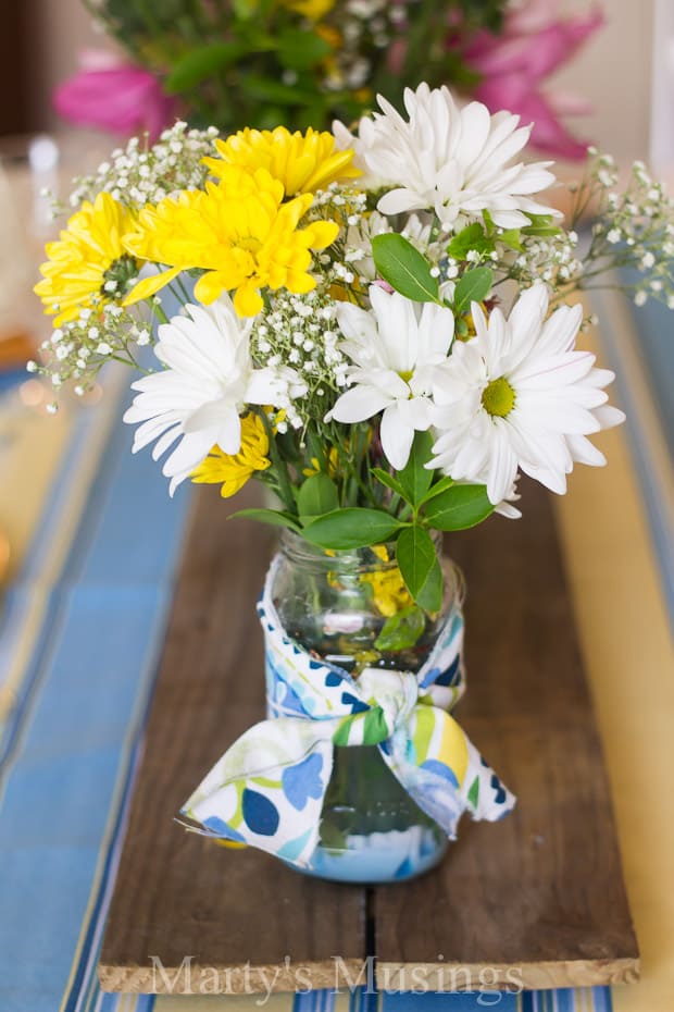 A bouquet of flowers in a vase on a table