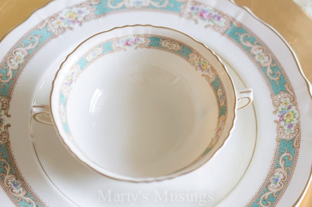 A piece of cake on a plate, with Table and Blue