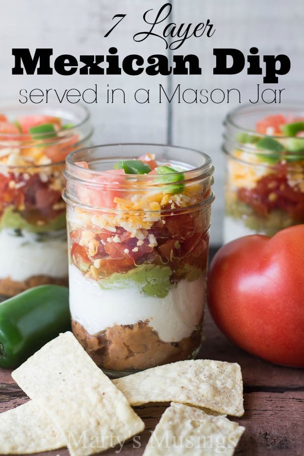 This Seven Layer Dip in a half pint sized mason jar looks adorable and tastes great! Perfect for any party or family gathering this mexican meal in a jar is both healthy and fun! It's also perfect for a make ahead lunch.