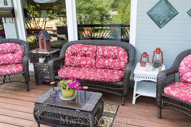 A living room filled with furniture and a fire place sitting in a chair