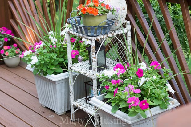 Outdoor shelves with flower planters and decor