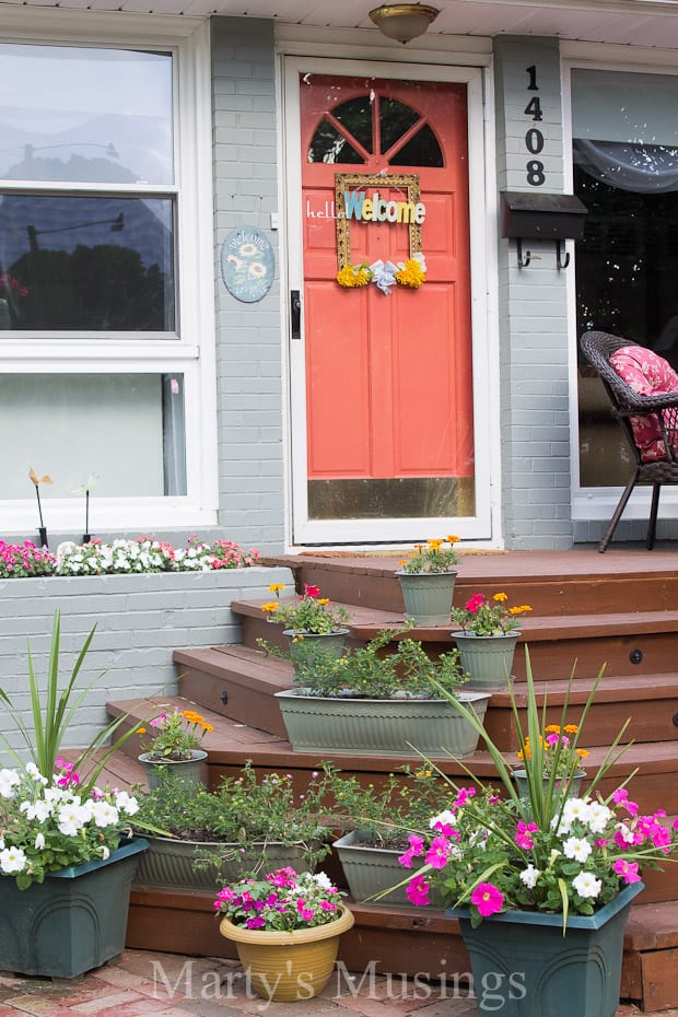 See how these DIY homeowners planned and converted their 1950's ranch style house into an updated home with terrific curb appeal and a fabulous front deck.