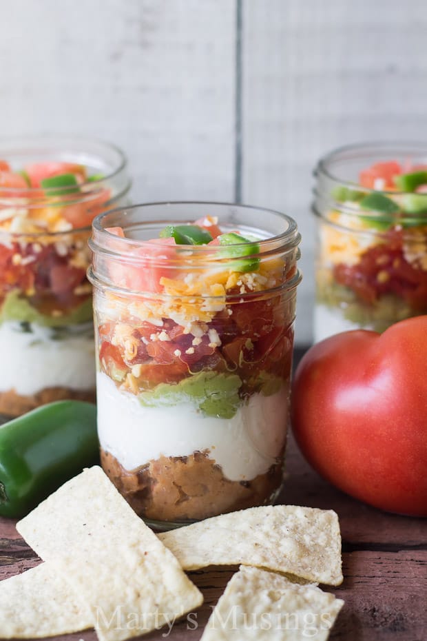 Food on a table, with Mason jar