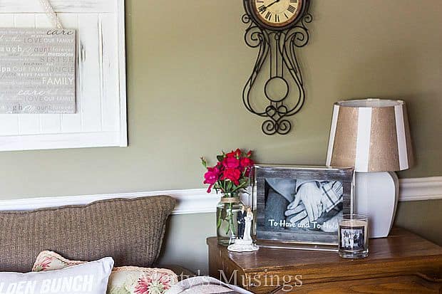 A living room filled with furniture and a clock