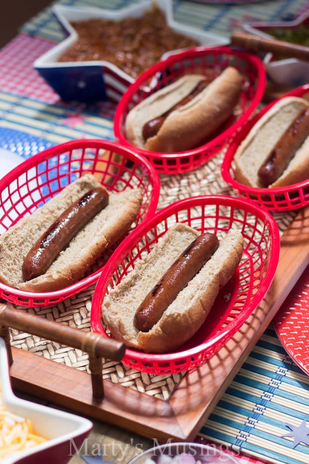 A couple of hot dogs sitting on a table