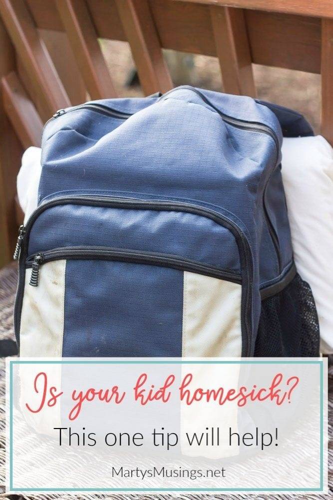 blue backpack and pillow for camp