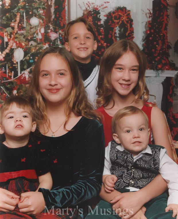 A group of people sitting posing for the camera