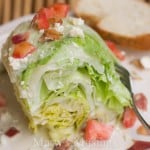 A plate of food, with Salad and Blue cheese dressing