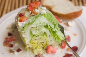 A plate of food, with Salad and Blue cheese dressing