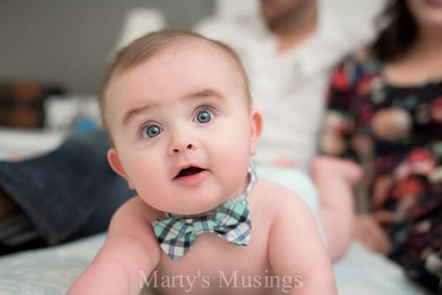 A baby sitting in a chair