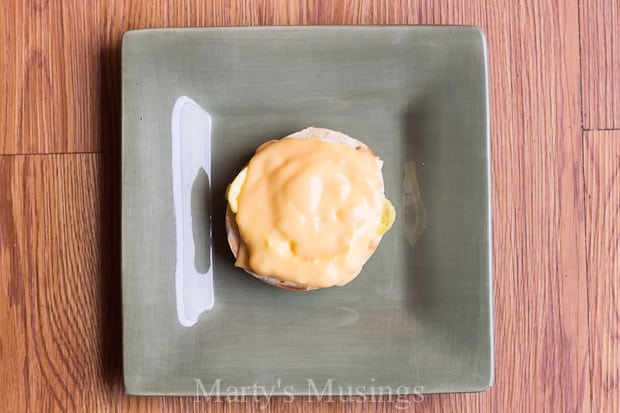 A tray of food on a wooden table, with Ice