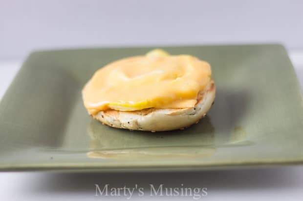 A piece of food on a tray, with Breakfast sandwich