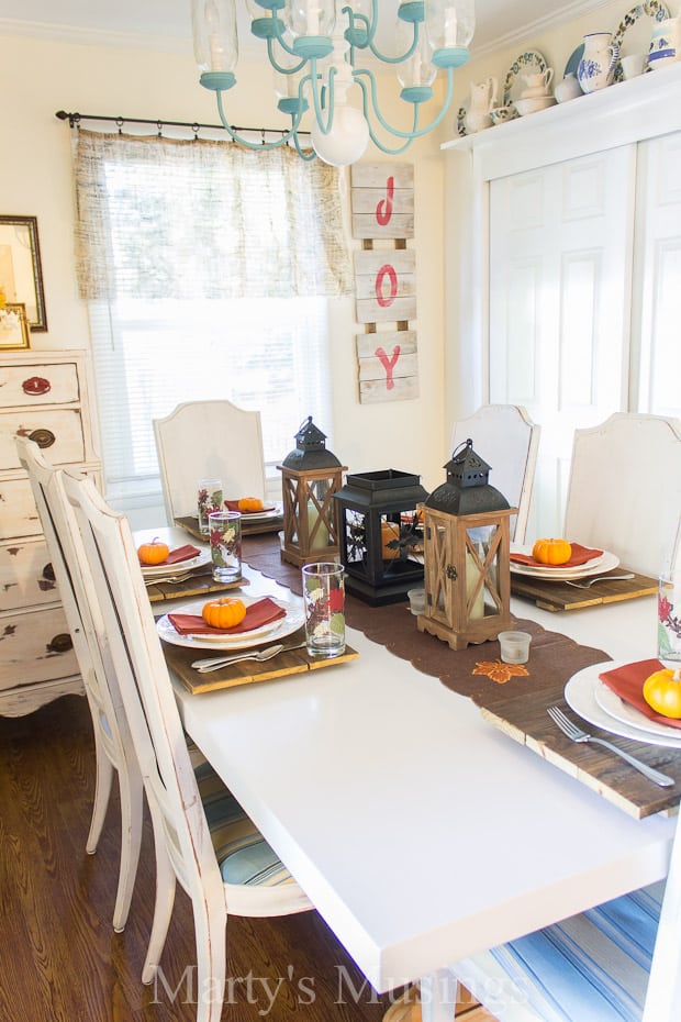 A kitchen with a dining room table