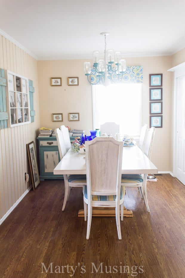 A living room filled with furniture on top of a hard wood floor