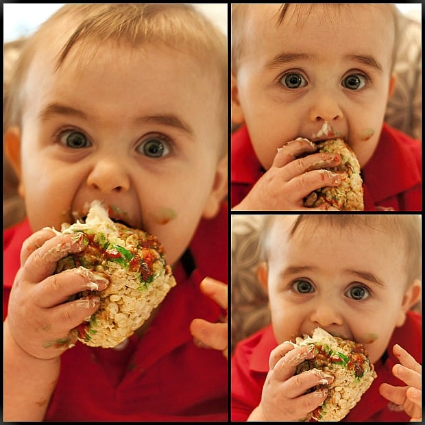 A small child is eating a slice of pizza