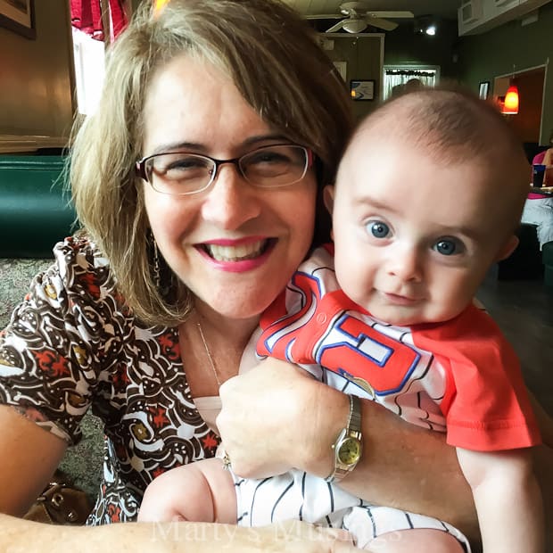 A woman holding a baby